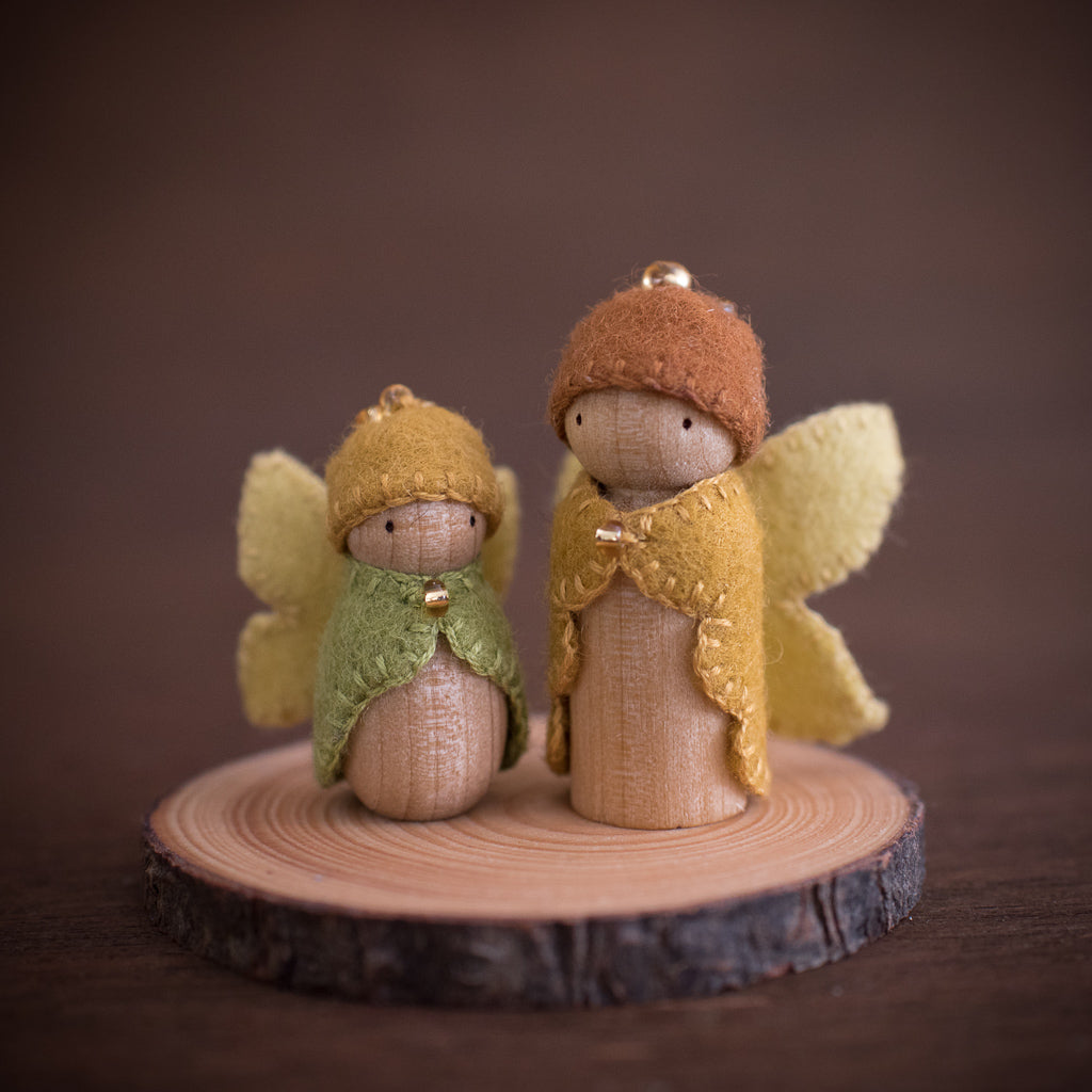 Australian fairy doll made from wood and felt in a Steiner style